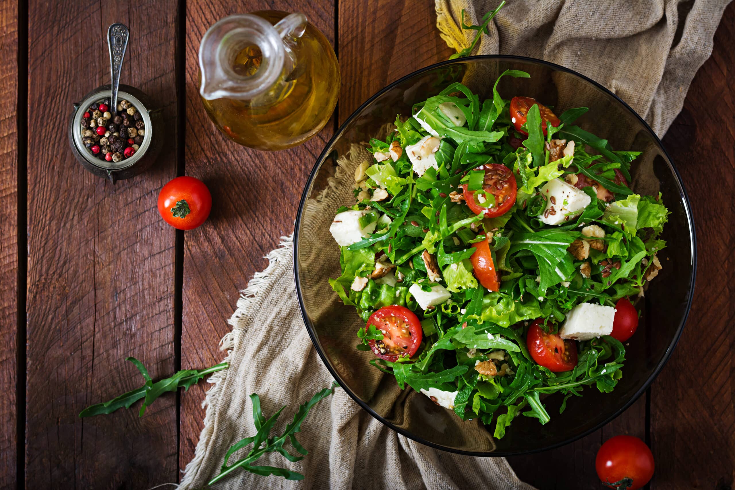 Salad of fresh vegetables, herbs, feta cheese and nuts. Dietary menu. Proper nutrition.
