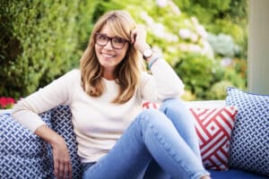 Middle-aged woman looking happy - chiropractic care at Turning Point Wellness can help ease menopause symptoms