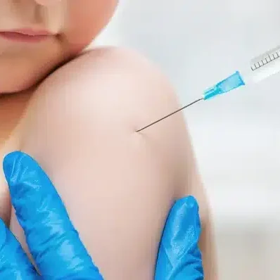 depositphotos_43370903-stock-photo-boy-and-vaccine-syringe